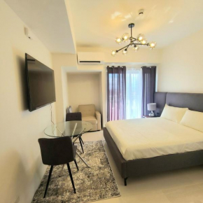 INSPIRIA Condo with Free Airport Pickup